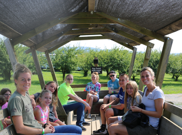 Families sitting together outdoors