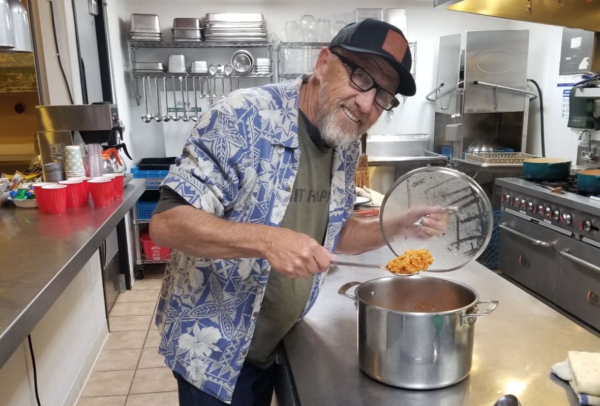 A man preparing a meal