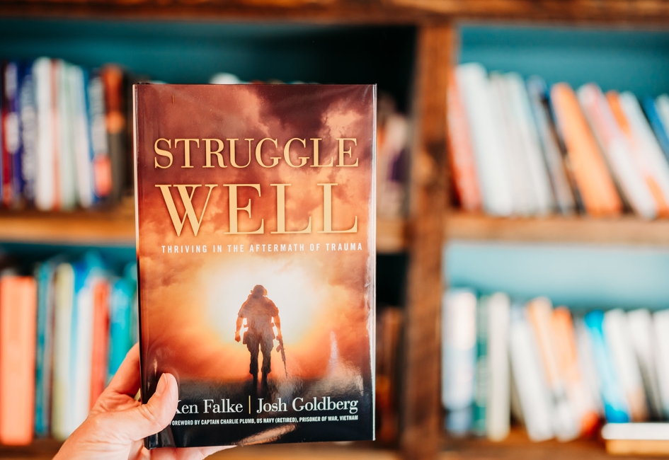 The Struggle Well book held in a hand