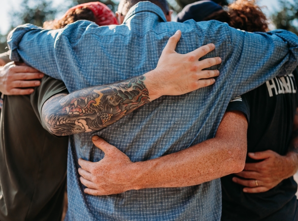 Veterans hugging close up