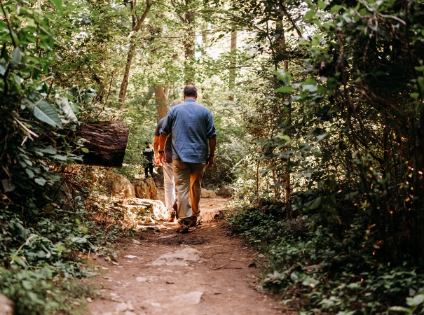 posttraumatic growth (PTG) training program men walking woods nature