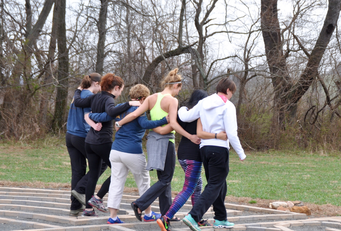 Women walking through a maze