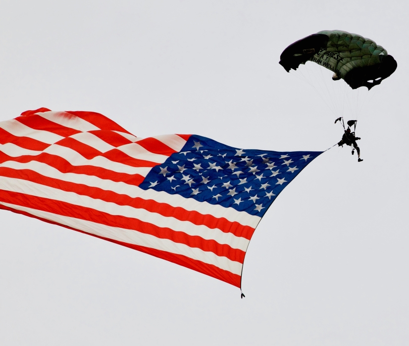 An American flag and a parachute